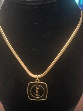 Gold-Tone Necklace with Black Enamel Pendant featuring Monogram Detail